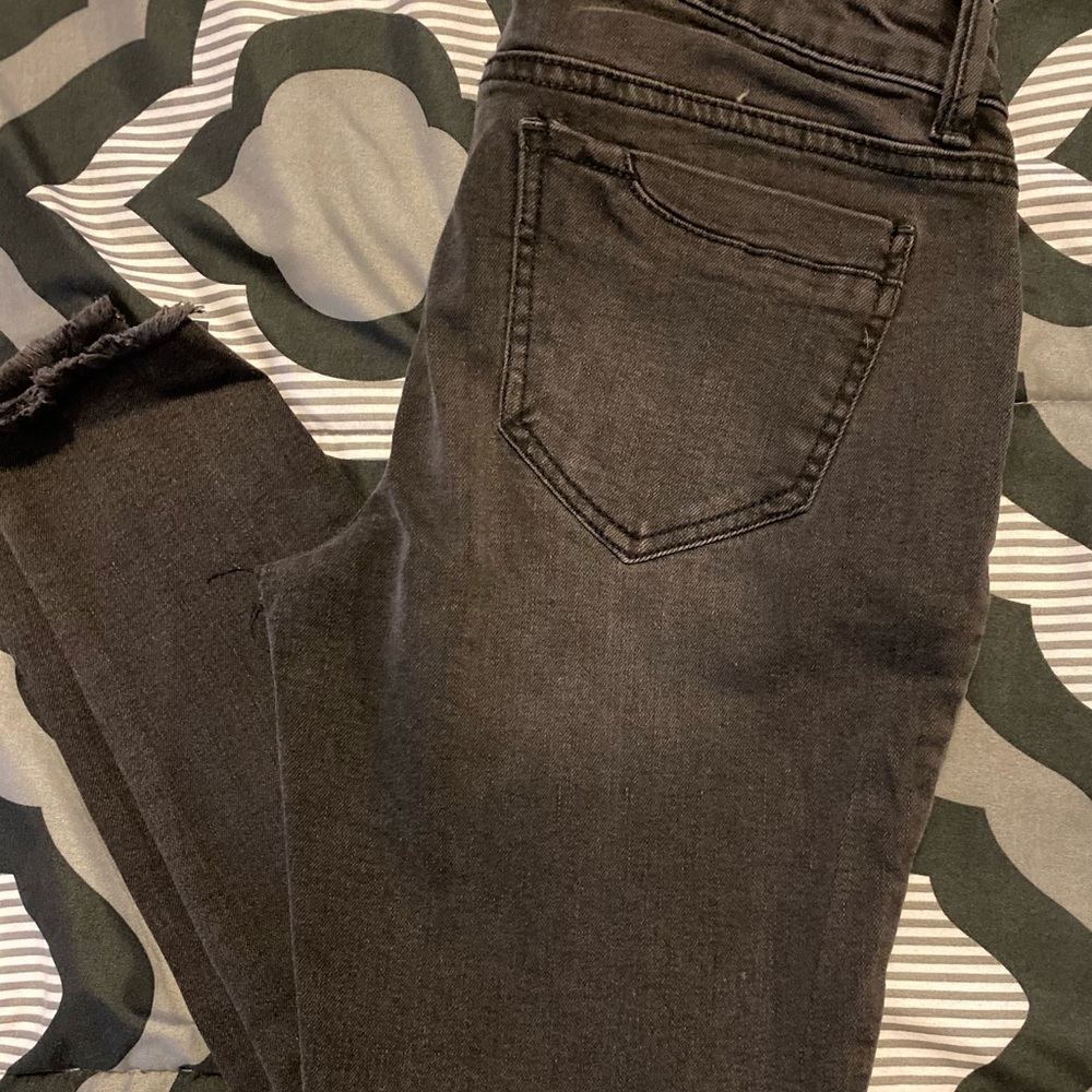 Black stonewashed ripped skinny jeans